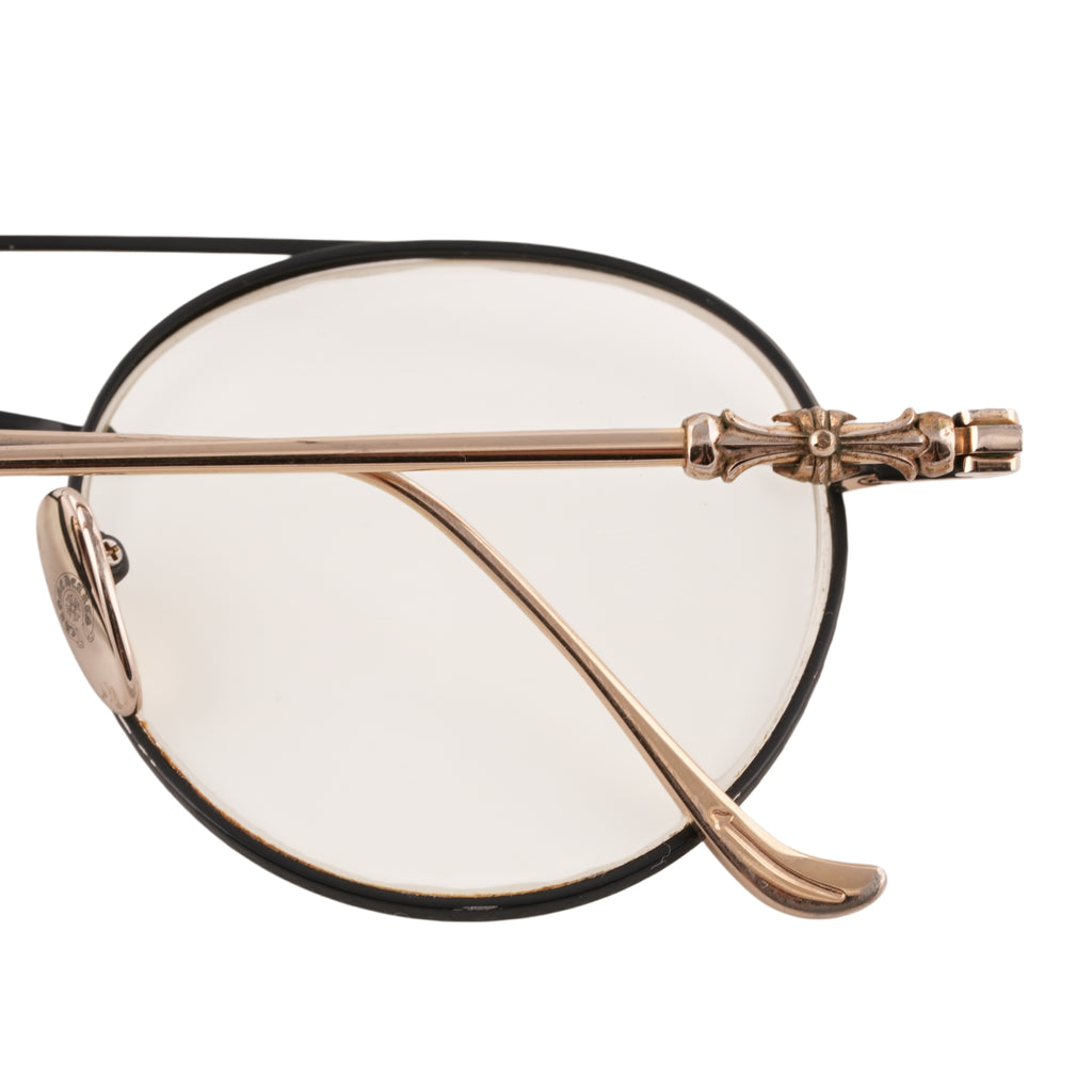 Dylan Took It > Black and rose gold aviator-style eyeglasses with cross motif temple